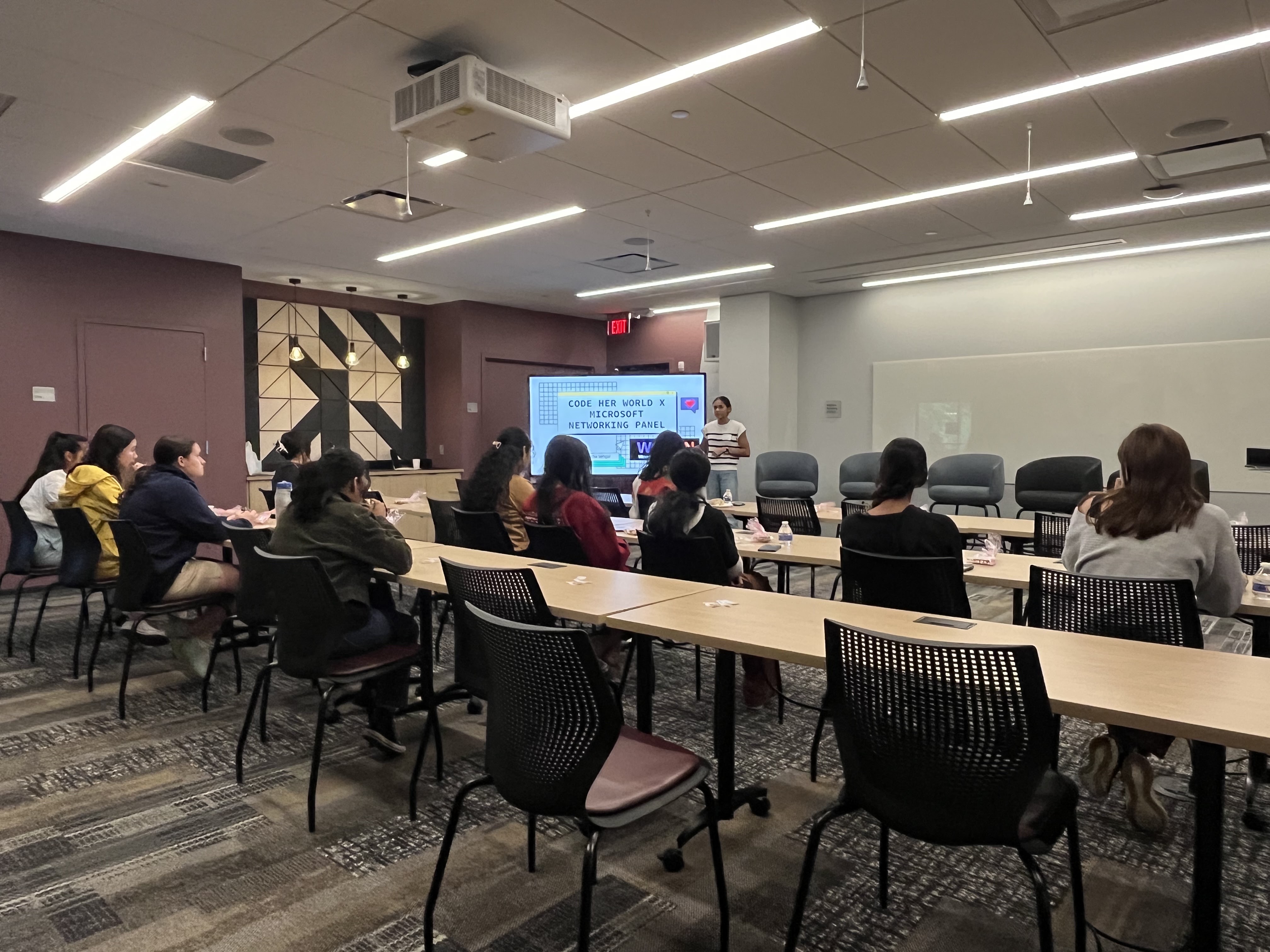 Students listening to the panel discussion