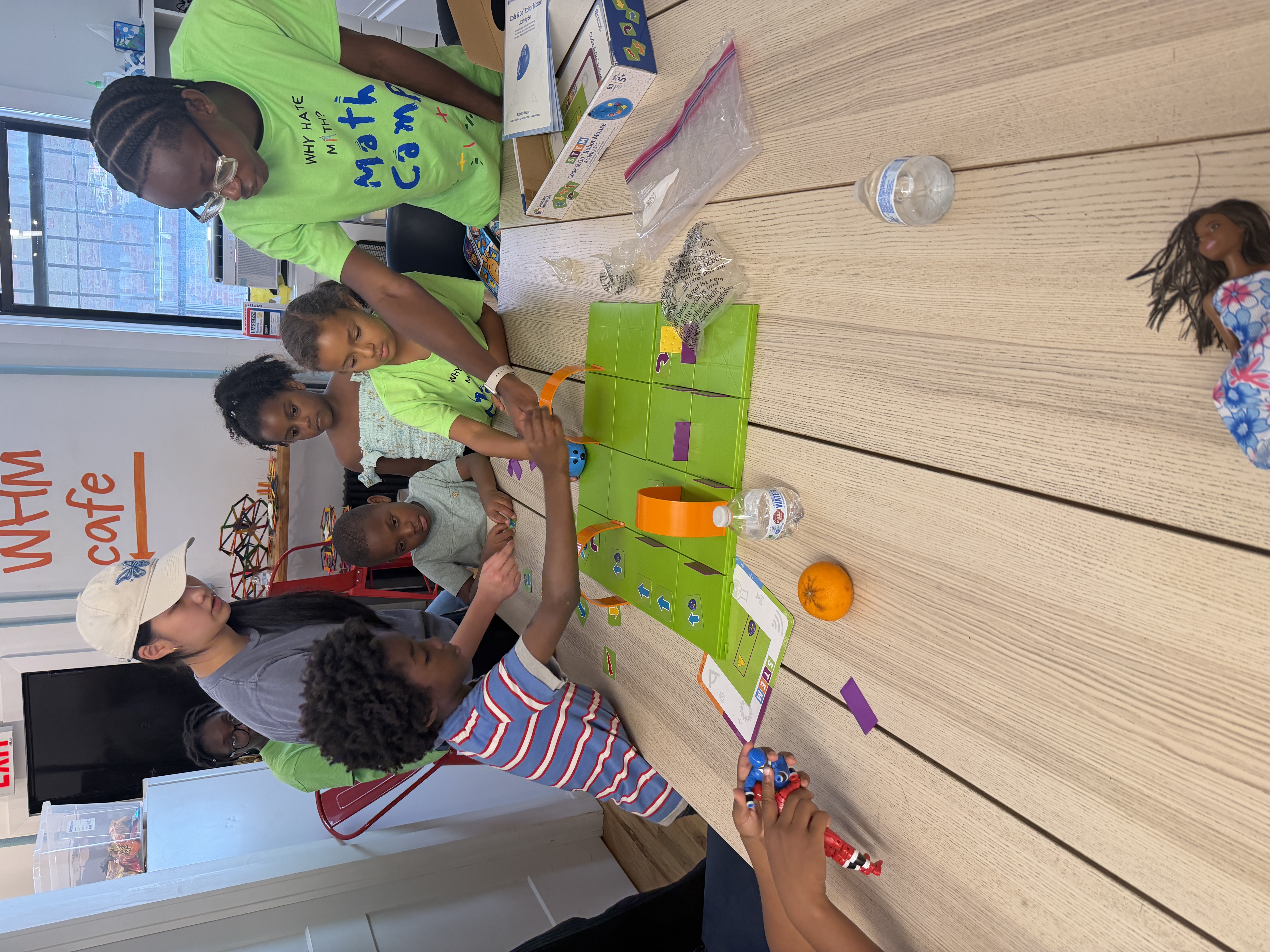 Students programming robot mice at summer camp